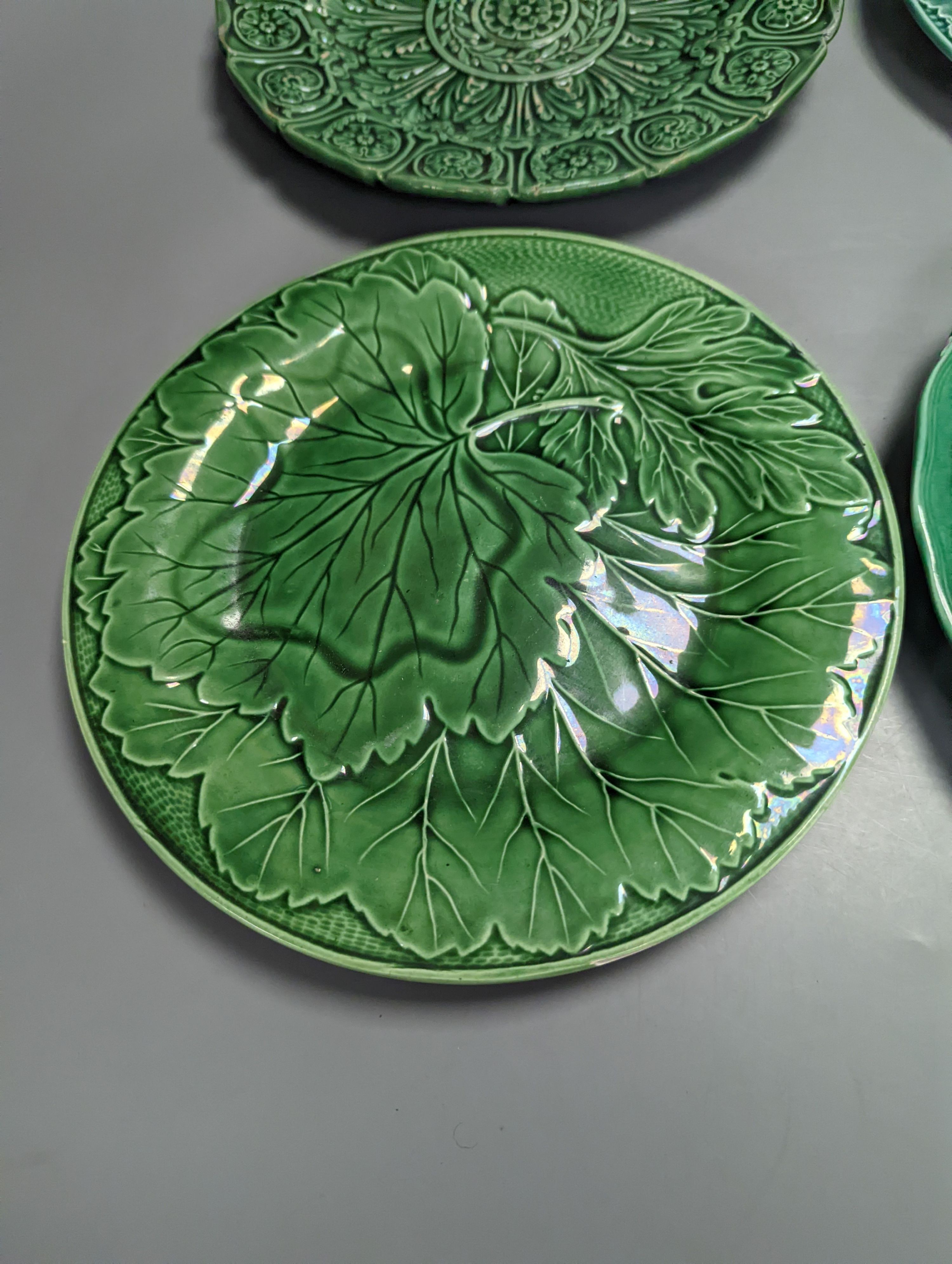 Twelve Victorian and later green glazed leaf dishes, largest 25.5cm
